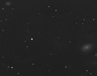 virgo cluster of galaxies under countryside skies