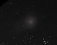 garradd comet through a telescope